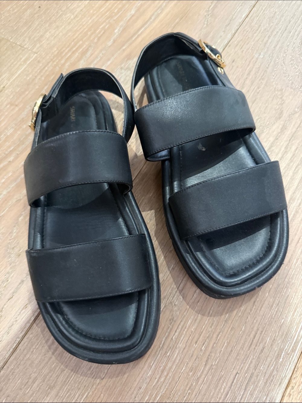 Stuart Weitzman Black Leather Double-Strap Sandals with Gold Buckle